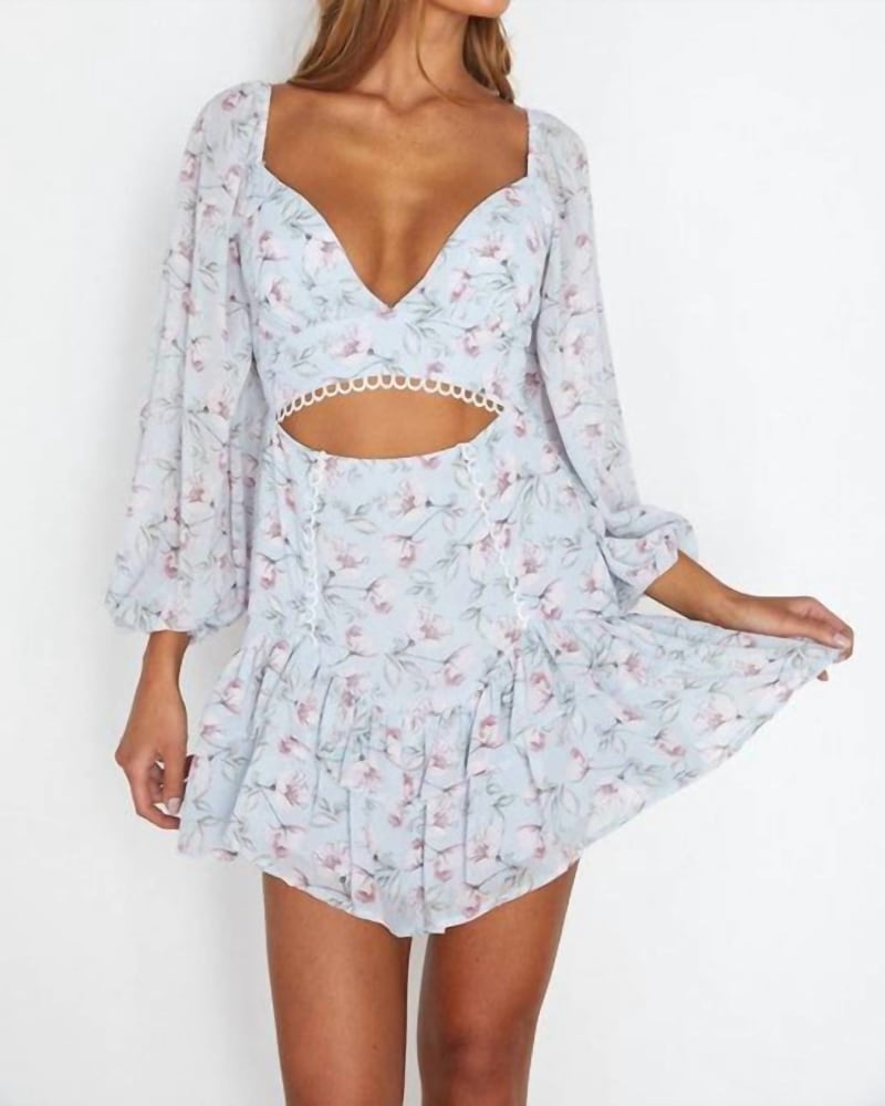 Front of a model wearing a size Large The Becca Floral Balloon Sleeve Cutout Mini Dress in Blue in Blue by One and Only Collective. | dia_product_style_image_id:340433